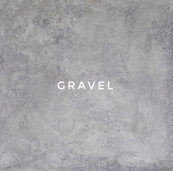 A textured gray backdrop with the word 'GRavel' displayed in the center